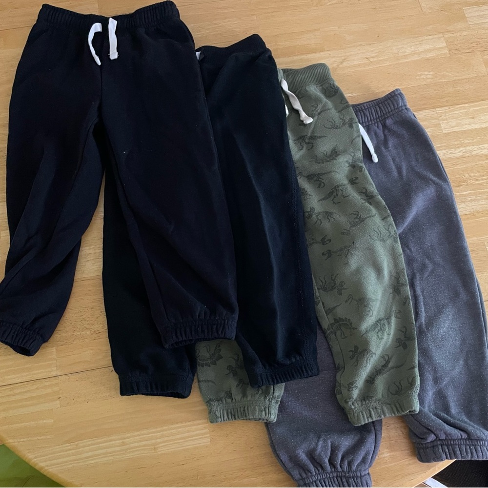4 Pairs Joe Fresh Kids Joggers 1 Olive Dinosaur Print, 2 Black, 1 Grey